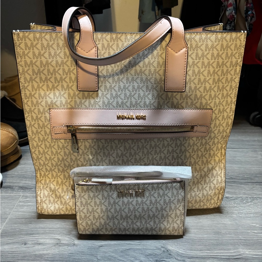 Large MK crossbody purse. AS IS for staining on handle and liner pictured here.